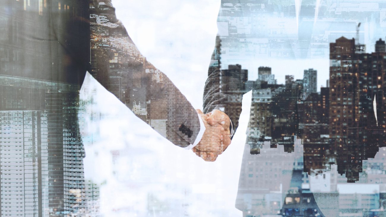 Corporate business handshake between business partners