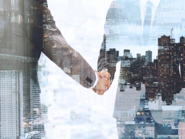 Corporate business handshake between business partners