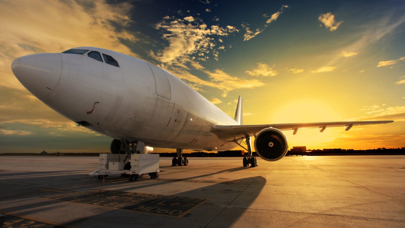 Airplane at sunset - back lit